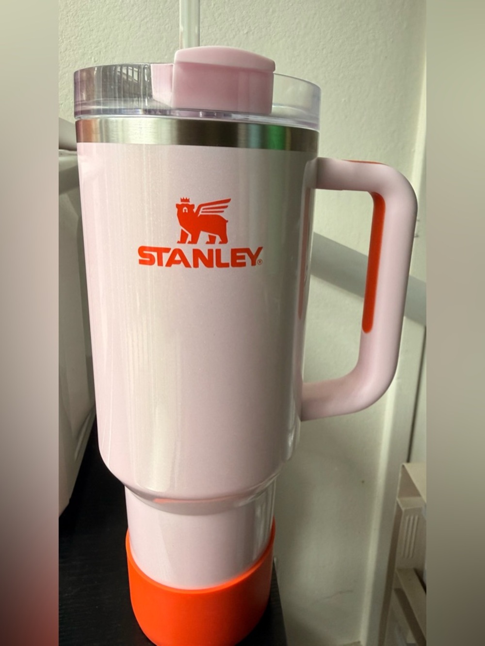 Stanley Light Pink Travel Mug with Orange Logo and Accents